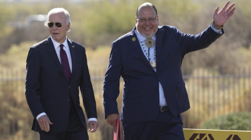 President Joe Biden and Gila River Indian Nation Governor Stephen Roe Lewis speak at Gila Crossing Public School, Friday, Oct. 25, 2024, Laveen, Ariz. (AP Photo/Rick Scuteri)